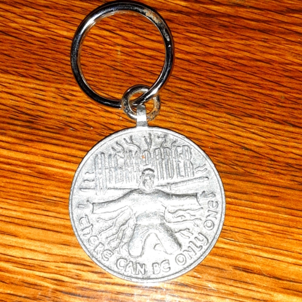 HIGHLANDER COIN KEY CHARM NRMINT